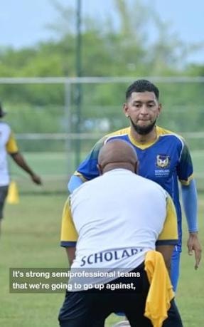 Scholars International players sharing a moment on the football field